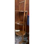 A three tiered oak cake stand; together with a towel rail, 69cmW