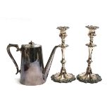 A pair of silver plated candlesticks, each 26.5cmH; together with a plated teapot