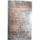 An enamel sign 'Notice, Allotments Act, 1922' issued by the National Allotments and Gardens