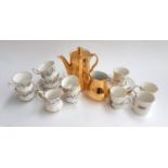 A Royal Albert 'Brigadoon' part coffee set comprising 6 cups and saucers, and a cream jug,