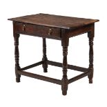 A late 17th or early 18th century oak side table, 86cm wide, 55cm deep, 73cm high