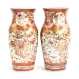 A pair of Japanese Meiji era vases, decorated with panels of court scenes and sparrows amongst