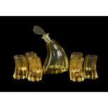 A Moser amber glass 'Annagelb' spirit set, mid 20th century in Art Deco style, the wave form
