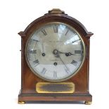 A Regency domed mahogany pad-top bracket clock, the silvered dial signed 'Chas Packer & Co Ltd, 76 &