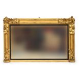 A Victorian carved giltwood overmantel mirror, applied carved acanthus leaves, the plate within a