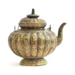 A 19th century Thai niello gilded silver kar-nam-tom teapot, of lobed form on a spreading base, prof