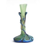 Attributed to Michele Luzoro (b.1949), a French iridescent art glass vase of organic tapering