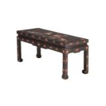 A Japanese black and polychrome lacquered low table, late 19th century, 107cm wide, 39cm deep,