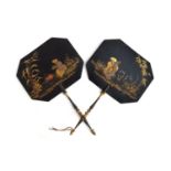 A pair of 19th century black lacquered papier mache face screens, each painted with chinoiserie