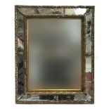 A gilt gesso mirror, with mirrored inset frame, 45cm wide, 55cm high