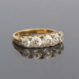 A late Victorian diamond five stone ring, in unmarked 18ct gold, the diamonds set with diamond