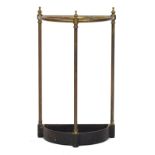 A brass and cast iron demilune stick stand, 38cm wide, 65cm high