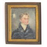 A 19th century portrait miniature on ivory of a gentleman in Regency dress, in a brass frame, 8.