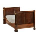 A 19th century French empire period mahogany and ormolu mounted 'lit en bateau' sleigh bed, 116cm