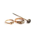 A 9ct gold love knot ring set with a small diamond, size M 1/2, 1.5g; together with a 9ct ring set
