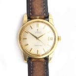 An Omega Seamaster gent's automatic steel and gold plated wrist watch, the silvered dial with date