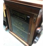 A 19th century mahogany marquetry and gilt metal mounted pier cabinet, the glazed front reading '
