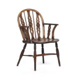 A 19th century ash and elm Windsor armchair, of Prior type, attributable to J & R Prior, Uxbridge,
