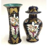 A Chinese cobalt blue and white sleeve vase, decorated with gilt butterflies and birds, with