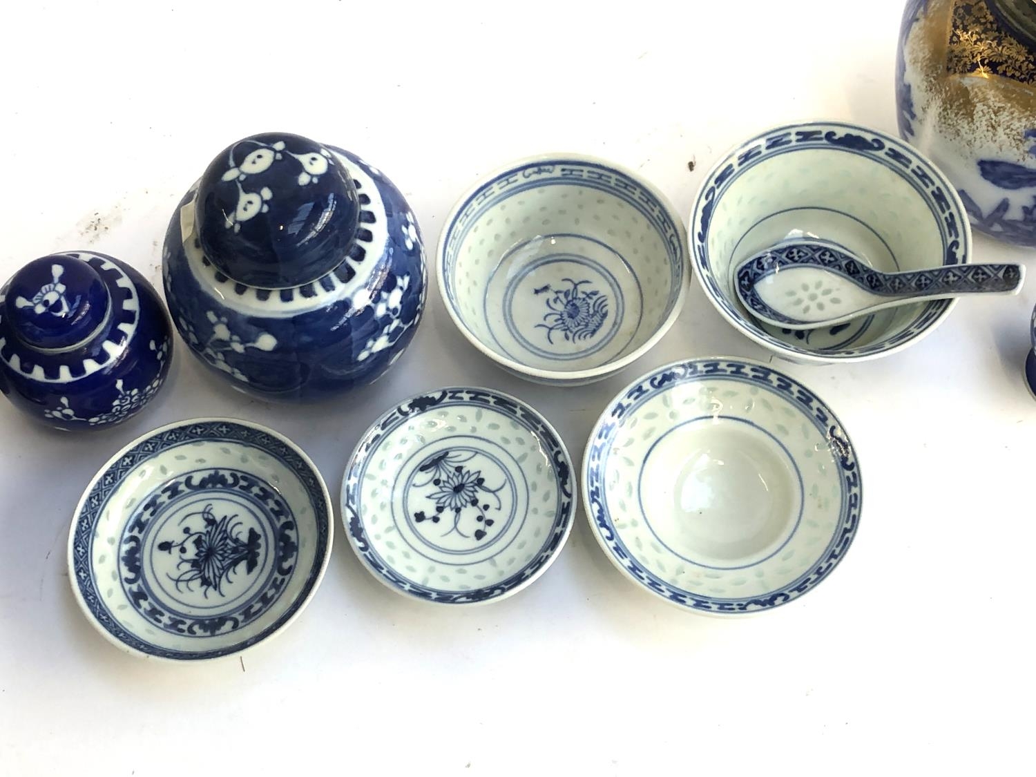 A mixed lot of blue and white ceramics to include Chinese rice ware; prunus vases; Doulton biscuit - Image 2 of 2