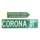 A cast iron sign 'Psychiatric Ward Please Enter With Caution', 39cmW; together with a road sign