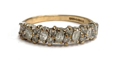 A 9ct gold ring set with white stones, one missing, 2.5g. size Q