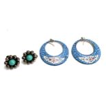 A pair of Persian minakari enamel hoop earrings with yellow metal hooks; together with silver floral