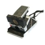 A Polaroid SX-70 Sonar AutoFocus Land Camera