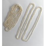 A long freshwater pearl single strand necklace, 67cmL; together with two rice pearl necklaces,