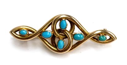 An Art Nouveau 15ct gold and turquoise brooch of swirling form, possibly Murrle Bennett & Co., 4.5cm