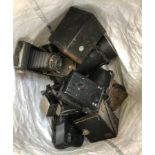 A quantity of cameras and photographic equipment to include Lubitel 2, Kodak Brownie Junior, Kodak