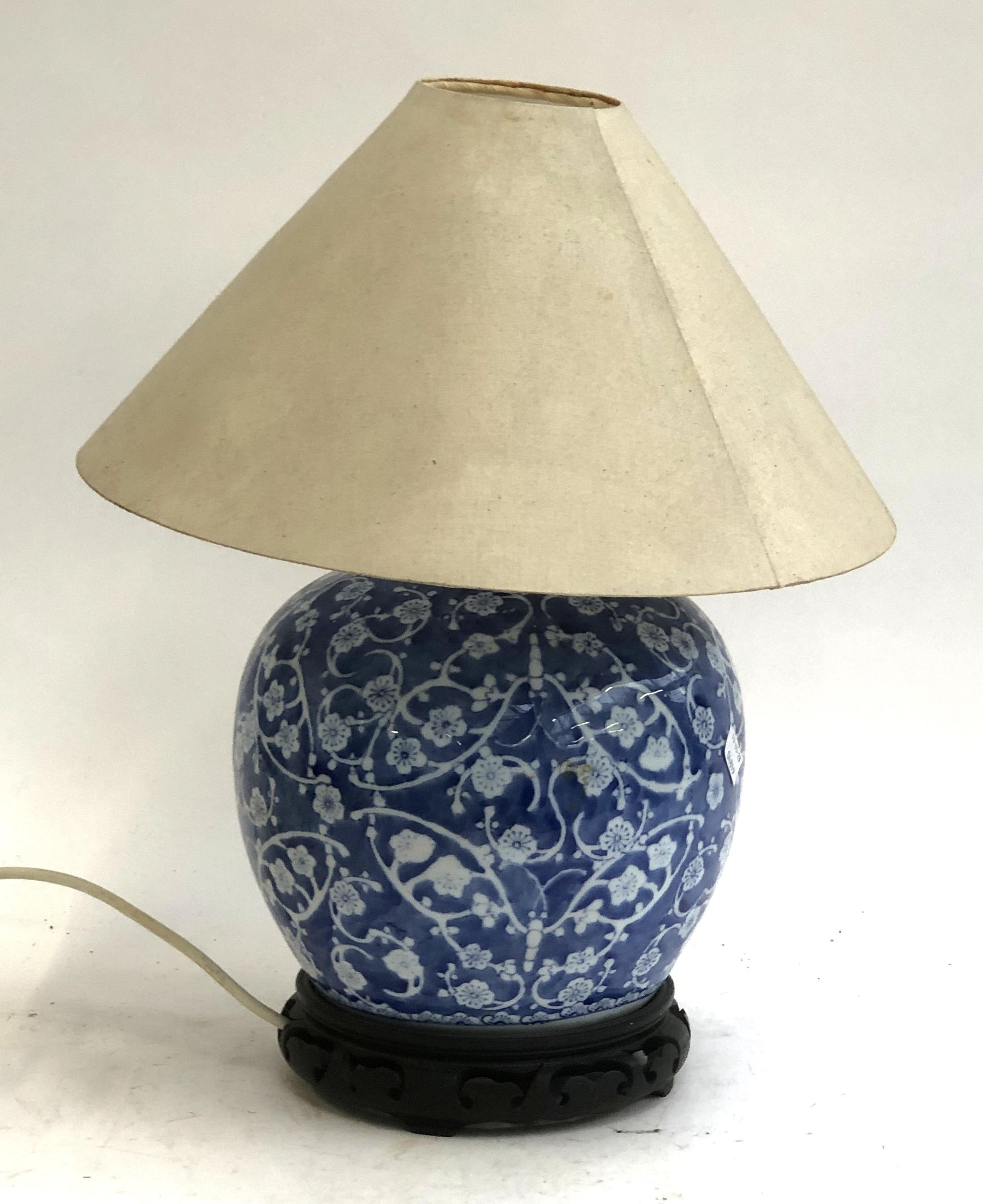 A Chinese blue and white ginger jar, converted as a table lamp, 46cm to top of shade