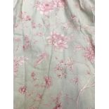 A pair of good country house curtains, lined and interlined, in a pink floral print, each approx