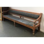 A long 19th century scumble painted hall bench, approx. 258cm long, the seat 45cm high, 50cm deep