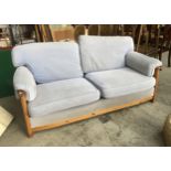 A three seater pine framed sofa, 192cmW