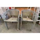 A set of six metal garden chairs