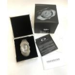 An Oakley Time Bomb watch, with original box and paperwork