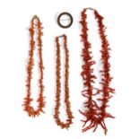 Three branch coral necklaces and a white metal and coral circular brooch, 3cmD