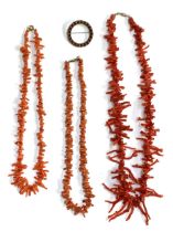 Three branch coral necklaces and a white metal and coral circular brooch, 3cmD