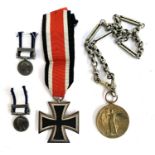 A WWII German Iron Cross dated 1939, together with a Great War for Civilisation medal 1914-1919 on a