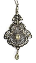 A Belle Epoque silver and paste openwork lavaliar pendant on a silver chain, 6.5cmL