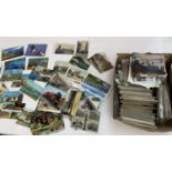 A large quantity of postcards to include local interest, steam engines, cars, locomotives, London,