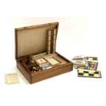 A vintage games compendium comprising cribbage, chess, canasta, wooden scrabble letters etc