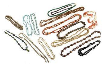 A quantity of beaded necklaces to include a garnet necklace; coral and shell; West German black