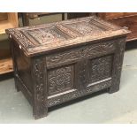 An 18th century and later two panel oak cover, with candle box, 81x47x53cmH