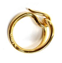 A Hermes yellow metal scarf ring, stamped, 3cmW