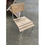 A garden chair with wooden slats