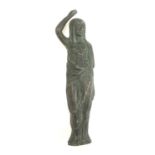 A patinated bronze figure of a lady in classical dress, 17cm high