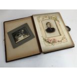 A Victorian photograph album containing approx. 26 black and white photographs