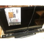 An LG LCD television, 37", with LG sound bar